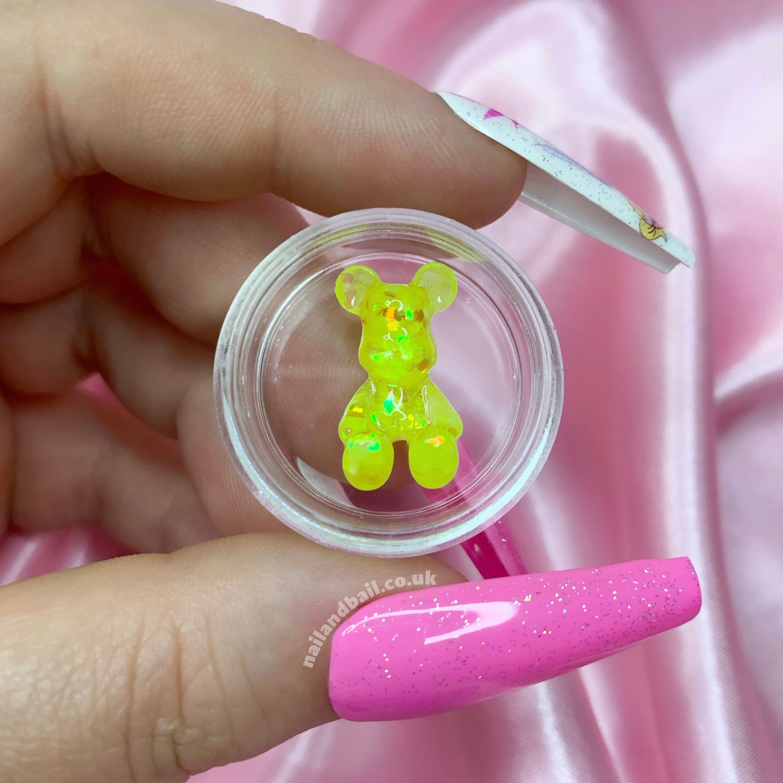Introducing our adorable handmade Bright Glitter Bear Nail Charms, the perfect way to add a touch of whimsy and sparkle to your manicure! These charming bear-shaped nail charms are a must-have for any girly girl who loves to express her unique style.
